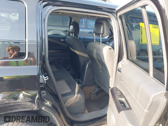 2014 Jeep Patriot Sport with VIN 1C4NJPBA3ED720412, listed as a IAAI auction lot 42390785 with 215,446 mi miles and . Bid and sale history available at DreamBid. Image 8.