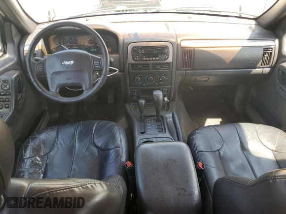 2001 Jeep Grand Cherokee Laredo z VIN 1J4GW48S61C537640, wystawiony jako Copart lot #58266135 z przebiegiem 188 475 mil mil oraz Szkoda całkowita • Salvage title. Historia ofert i sprzedaży dostępna na DreamBid. Obrazek 8.