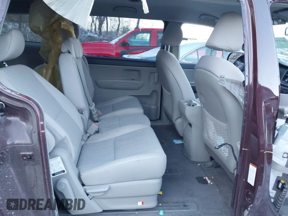 2020 Kia Sedona LX with VIN KNDMB5C18L6617371, listed as a IAAI auction lot 41378524 with 59,092 mi miles. Bid and sale history available at carsss.com. Image 8.