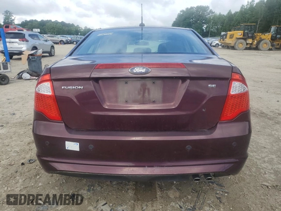 2012 Ford Fusion SE with VIN 3FAHP0HA1CR353479, listed as a Copart auction lot 59677935 with 27,727 mi miles and Salvage title. Bid and sale history available at DreamBid. Image 6.