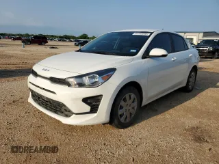 2023 Kia Rio S z VIN 3KPA24AD5PE566079, wystawiony jako Copart lot #54148995 z przebiegiem 28 248 mil mil oraz Szkody całkowita. Historia ofert i sprzedaży dostępna na DreamBid. Obrazek 1.