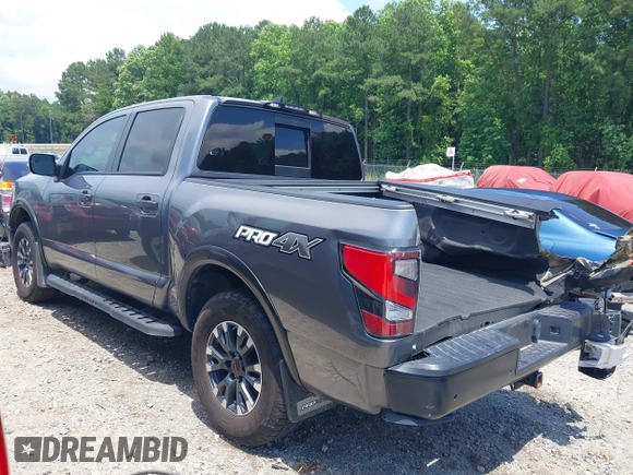 2024 Nissan Titan Pro-4X with VIN 1N6AA1ED8RN114313, listed as a IAAI auction lot 42498591 with 21,955 mi miles and . Bid and sale history available at DreamBid. Image 3.