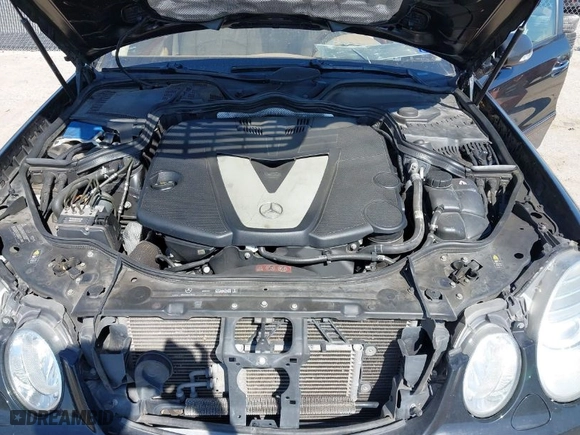 2009 Mercedes-Benz E-Class 3.0L with VIN WDBUF22X79B395557, listed as a IAAI auction lot 41672452 with 91,354 mi miles. Bid and sale history available at carsss.com. Image 10.
