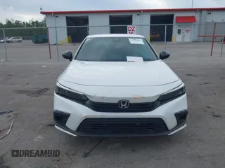 2022 Honda Civic Sport z VIN 2HGFE2F58NH560122, wystawiony jako IAAI lot #41193826 z przebiegiem 50 005 mil mil oraz . Historia ofert i sprzedaży dostępna na DreamBid. Obrazek 12.