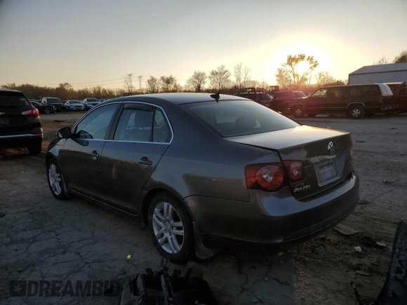 2009 Volkswagen Jetta z VIN 3VWAL71K09M133238, wystawiony jako Copart lot #81069654 z przebiegiem 153 617 mil mil oraz Szkoda całkowita • Salvage title. Historia ofert i sprzedaży dostępna na DreamBid. Obrazek 2.