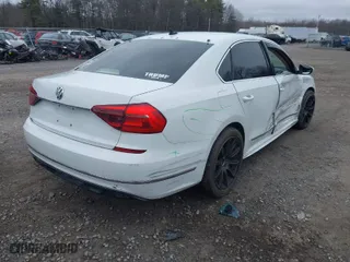 2017 Volkswagen Passat R-Line w/Comfort Pkg with VIN 1VWDT7A32HC016590, listed as a IAAI auction lot 41855085 with 166,089 mi miles. Bid and sale history available at carsss.com. Image 4.