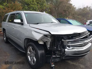 2016 Chevrolet Suburban LTZ with VIN 1GNSCJKC4GR463933, listed as a IAAI auction lot 41208065 with 153,404 mi miles and . Bid and sale history available at DreamBid. Image 1.
