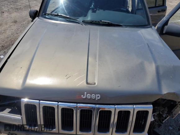 1997 Jeep Grand Cherokee Laredo with VIN 1J4GZ58S7VC505069, listed as a Copart auction lot 63255945 with 127,552 mi miles and Salvage title. Bid and sale history available at DreamBid. Image 12.