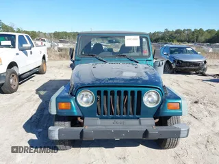 1997 Jeep Wrangler SE with VIN 1J4FY29P2VP492327, listed as a IAAI auction lot 41824808 with 156,646 mi miles. Bid and sale history available at carsss.com. Image 6.