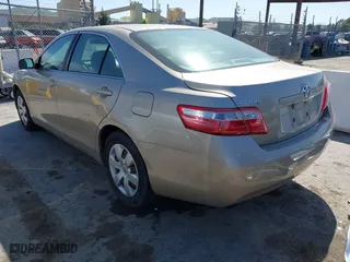 2007 Toyota Camry CE with VIN 4T1BE46K97U180782, listed as a IAAI auction lot 42046103 with 171,607 mi miles. Bid and sale history available at carsss.com. Image 3.