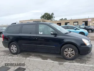 2012 Kia Sedona LX with VIN KNDMG4C78C6502141, listed as a IAAI auction lot 41725800 with 153,789 mi miles and . Bid and sale history available at carsss.com. Image 12.