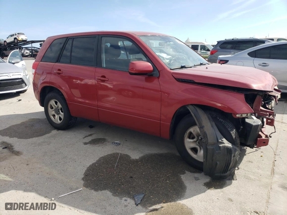2012 Suzuki Grand Vitara Premium with VIN JS3TE0D28C4100856, listed as a Copart auction lot 85594104 with 96,504 mi miles and Salvage Title. Bid and sale history available at carsss.com. Image 4.