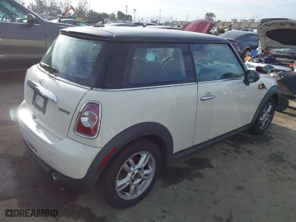 2012 MINI Cooper Hardtop with VIN WMWSU3C5XCT259021, listed as a IAAI auction lot 41910293 with 152,275 mi miles. Bid and sale history available at carsss.com. Image 4.