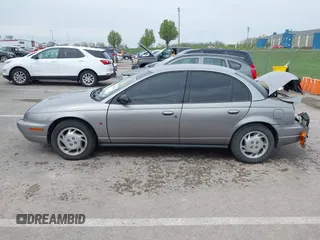 1997 Saturn SL with VIN 1G8ZK527XVZ257477, listed as a IAAI auction lot 42029648 with 114,371 mi miles and . Bid and sale history available at DreamBid. Image 14.