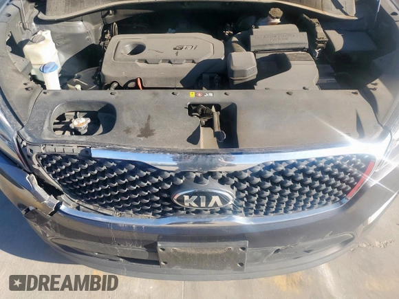 2017 Kia Sorento LX z VIN 5XYPG4A36HG211042, wystawiony jako Copart lot #48977085 z przebiegiem 130 892 mil mil oraz Szkoda całkowita • Salvage title. Historia ofert i sprzedaży dostępna na DreamBid. Obrazek 12.