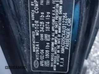 2004 Hyundai Accent GL with VIN KMHCG35CX4U312284, listed as a Copart auction lot 83992384 with 88,786 mi miles and Salvage Title. Bid and sale history available at carsss.com. Image 12.