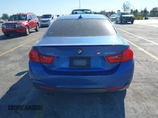 2015 BMW 4 Series 428i xDrive with VIN WBA3N9C57FK247763, listed as a IAAI auction lot 41783892 with 158,813 mi miles and . Bid and sale history available at DreamBid. Image 16.