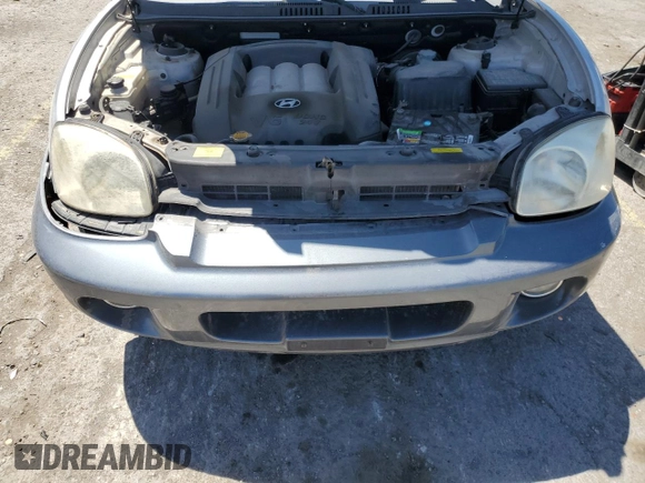 2005 Hyundai Santa Fe GLS z VIN KM8SC13D35U914839, wystawiony jako Copart lot #58273155 z przebiegiem 182 907 mil mil oraz Szkoda całkowita • Salvage title. Historia ofert i sprzedaży dostępna na DreamBid. Obrazek 12.