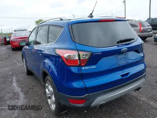2018 Ford Escape Titanium with VIN 1FMCU0J97JUD34272, listed as a IAAI auction lot 42078237 with 87,783 mi miles and . Bid and sale history available at DreamBid. Image 3.