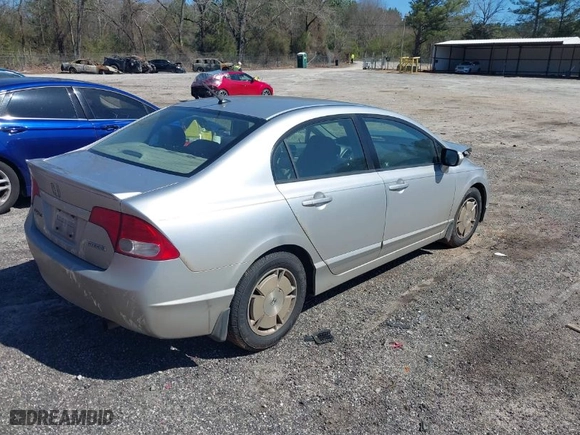 2009 Honda Civic Hybrid with VIN JHMFA36249S000925, listed as a IAAI auction lot 41823981 with 201,346 mi miles. Bid and sale history available at carsss.com. Image 4.
