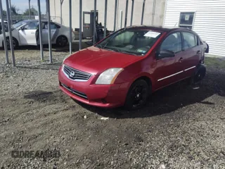 2012 Nissan Sentra 2.0 z VIN 3N1AB6AP9CL713129, wystawiony jako IAAI lot #42309760 z przebiegiem 143 699 mil mil oraz . Historia ofert i sprzedaży dostępna na DreamBid. Obrazek 2.
