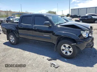 2015 Toyota Tacoma PreRunner with VIN 5TFJU4GN1FX074660, listed as a Copart auction lot 57364995 with 169,185 mi miles and Salvage title. Bid and sale history available at DreamBid. Image 4.