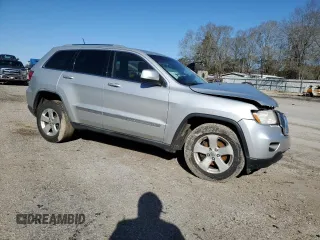 2012 Jeep Grand Cherokee Laredo with VIN 1C4RJEAG8CC212192, listed as a Copart auction lot 47857985 with 238,676 mi miles and Salvage Title. Bid and sale history available at carsss.com. Image 4.