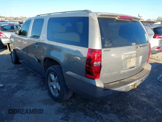 2007 Chevrolet Suburban LS with VIN 1GNFC16037J337224, listed as a IAAI auction lot 41297347 with 256,162 mi miles. Bid and sale history available at carsss.com. Image 3.