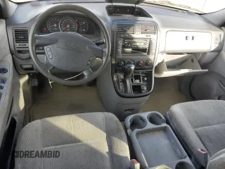 2005 Kia Sedona LX with VIN KNDUP132X56721558, listed as a Copart auction lot 88574685 with 176,660 mi miles and Salvage Title. Bid and sale history available at carsss.com. Image 8.