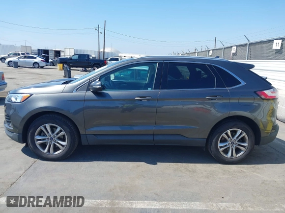 2019 Ford Edge SEL with VIN 2FMPK3J9XKBB76512, listed as a IAAI auction lot 42498683 with 119,513 mi miles and . Bid and sale history available at DreamBid. Image 14.