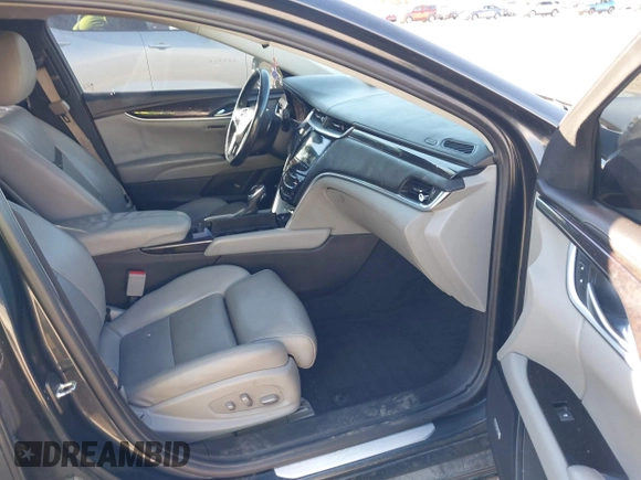 2013 Cadillac XTS Luxury with VIN 2G61P5S3XD9228218, listed as a IAAI auction lot 40503666 with 87,857 mi miles. Bid and sale history available at carsss.com. Image 5.