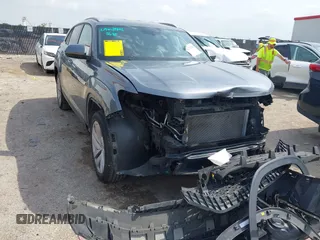 2020 Volkswagen Atlas with VIN 1V2YC2CA6LC205401, listed as a IAAI auction lot 42272256 with 67,382 mi miles and . Bid and sale history available at DreamBid. Image 1.