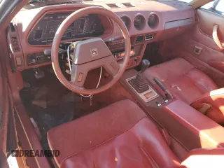 1983 Datsun 280ZX z VIN JN1HZ04S1DX572036, wystawiony jako Copart lot #76533294 z przebiegiem 172 147 mil mil oraz Nie do naprawy. Historia ofert i sprzedaży dostępna na DreamBid. Obrazek 8.