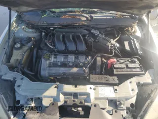 2004 Ford Taurus z VIN 1FAFP59SX4A141848, wystawiony jako Copart lot #79389104 z przebiegiem Nie podano mil oraz Nie do naprawy. Historia ofert i sprzedaży dostępna na DreamBid. Obrazek 11.