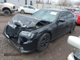 2015 Chrysler 300 with VIN 2C3CCAGGXFH831351, listed as a IAAI auction lot 41721941 with 106,577 mi miles. Bid and sale history available at carsss.com. Image 17.