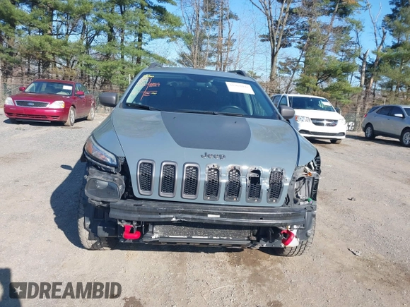 2014 Jeep Cherokee Trailhawk with VIN 1C4PJMBS4EW179763, listed as a IAAI auction lot 41988048 with 152,681 mi miles. Bid and sale history available at carsss.com. Image 13.