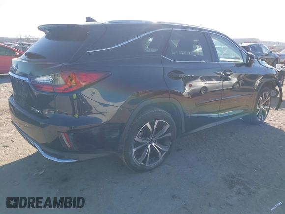 2018 Lexus RX with VIN JTJGZKCA2J2000671, listed as a IAAI auction lot 41390163 with 60,491 mi miles. Bid and sale history available at carsss.com. Image 4.