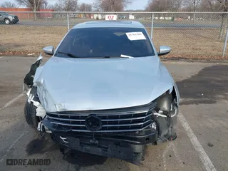 2016 Volkswagen Passat 1.8T SEL with VIN 1VWCT7A3XGC018484, listed as a IAAI auction lot 41763388 with 123,484 mi miles. Bid and sale history available at carsss.com. Image 12.