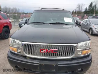 2003 GMC Yukon Denali with VIN 1GKEK63U73J310098, listed as a IAAI auction lot 41831615 with 262,134 mi miles. Bid and sale history available at carsss.com. Image 6.