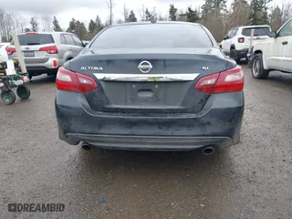 2018 Nissan Altima 2.5 SL with VIN 1N4AL3AP2JC210596, listed as a IAAI auction lot 41852215 with 100,540 mi miles. Bid and sale history available at carsss.com. Image 16.