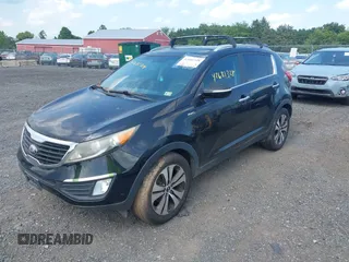 2013 Kia Sportage EX with VIN KNDPCCA23D7427564, listed as a IAAI auction lot 42681328 with 111,963 mi miles and . Bid and sale history available at DreamBid. Image 2.
