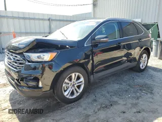 2020 Ford Edge SEL z VIN 2FMPK3J93LBA57329, wystawiony jako Copart lot #56996185 z przebiegiem 120 631 mil mil oraz Nie do naprawy • Non repairable. Historia ofert i sprzedaży dostępna na DreamBid. Obrazek 1.