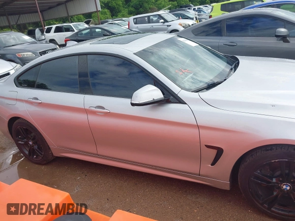 2015 BMW 4 Series 428i xDrive with VIN WBA4C9C50FD330482, listed as a IAAI auction lot 42116547 with 192,739 mi miles and . Bid and sale history available at DreamBid. Image 13.