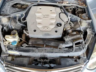 2005 Infiniti G35 with VIN JNKCV51E15M216377, listed as a Copart auction lot 57979994 with 147,084 mi miles and Salvage Title. Bid and sale history available at DreamBid. Image 12.