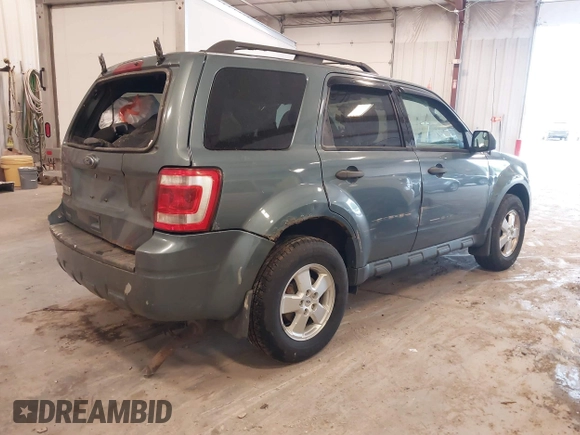 2012 Ford Escape XLT with VIN 1FMCU0D70CKC11664, listed as a IAAI auction lot 42280506 with 184,034 mi miles and . Bid and sale history available at DreamBid. Image 4.