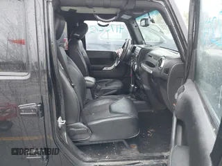 2013 Jeep Wrangler Unlimited Sport z VIN 1C4BJWDGXDL596450, wystawiony jako IAAI lot #42323862 z przebiegiem 114 105 mil mil oraz . Historia ofert i sprzedaży dostępna na DreamBid. Obrazek 5.