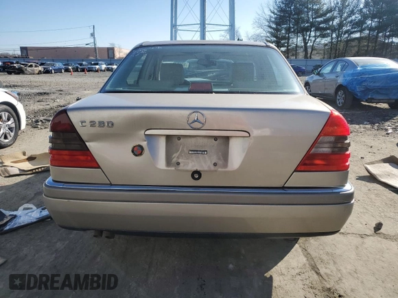 1996 Mercedes-Benz C with VIN WDBHA28E7TF319617, listed as a Copart auction lot 80874744 with 92,068 mi miles and Salvage Title. Bid and sale history available at carsss.com. Image 6.