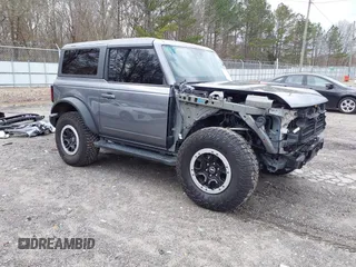 2023 Ford Bronco with VIN 1FMDE5CP2PLC03002, listed as a IAAI auction lot 41716102 with 23,529 mi miles. Bid and sale history available at carsss.com. Image 1.