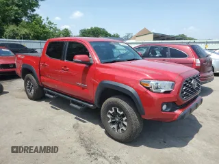 2021 Toyota Tacoma SR with VIN 3TMCZ5AN4MM394406, listed as a Copart auction lot 62268025 with 110,891 mi miles and Salvage title. Bid and sale history available at DreamBid. Image 4.