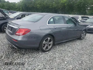 2019 Mercedes-Benz E 300 with VIN WDDZF4KB7KA553856, listed as a Copart auction lot 61025735 with 59,001 mi miles and Salvage title. Bid and sale history available at DreamBid. Image 3.